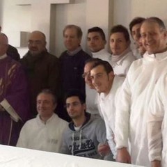 Monsignor Ricchiuti con i lavoratori di U TUB